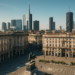 Veduta aerea di una città europea con edifici storici e moderni, simbolo del dinamismo degli investimenti immobiliari 2025